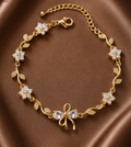 Jelora Bow Tulip Crystal Bracelet – Elegant Floral Gold-Plated Bracelet for Women